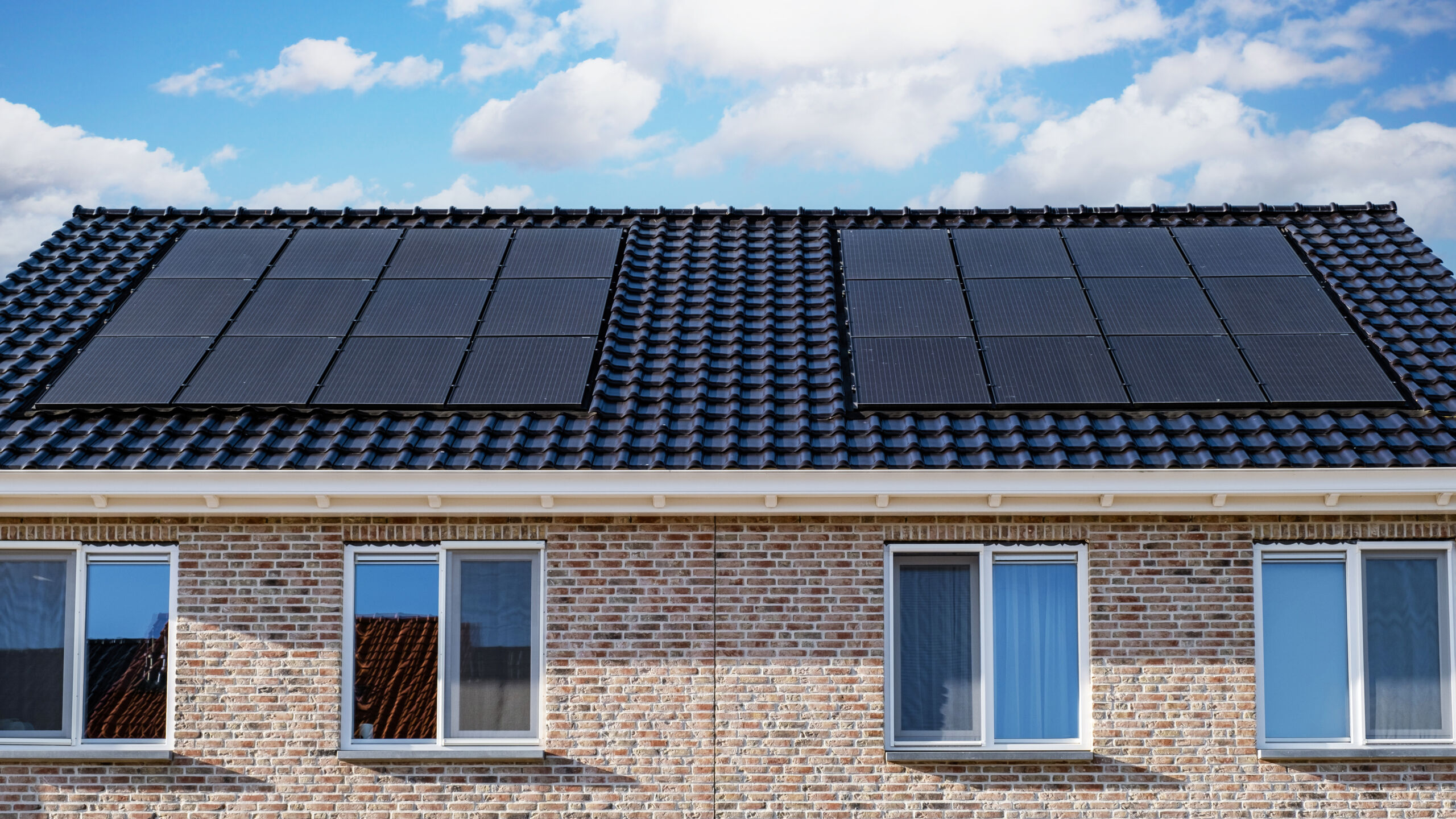 An image of a rooftop with solar panels. Which is better; Solar Financing or Leasing?
